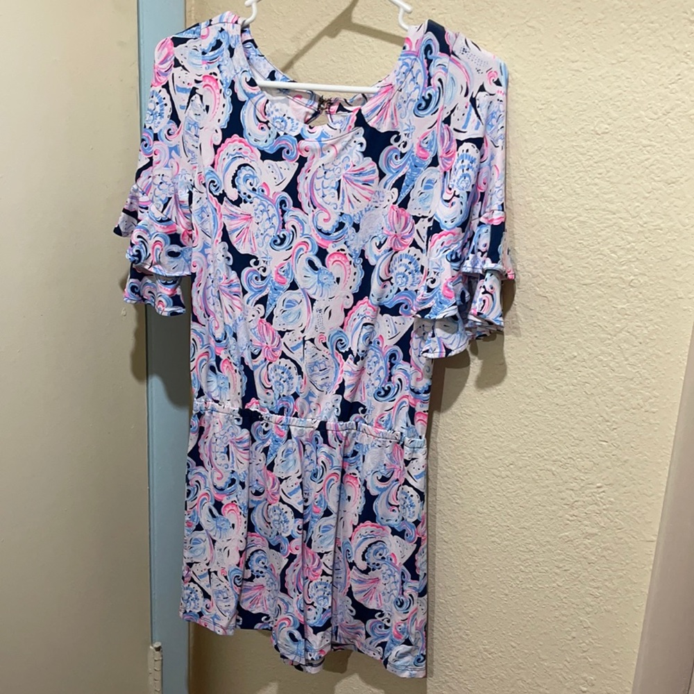 Pop out tag, never worn romper. Elastic waist